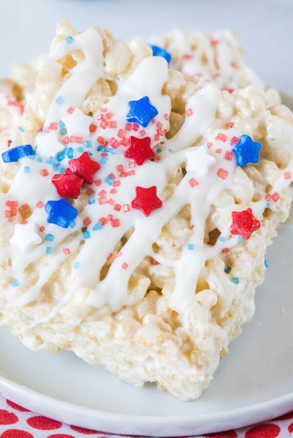 close up rice krispie treats with red and blue sprinkles