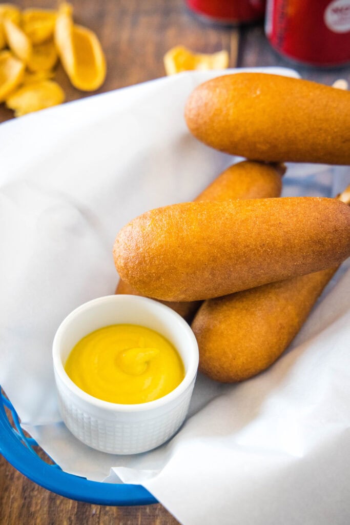 corn dogs arranged in a basket