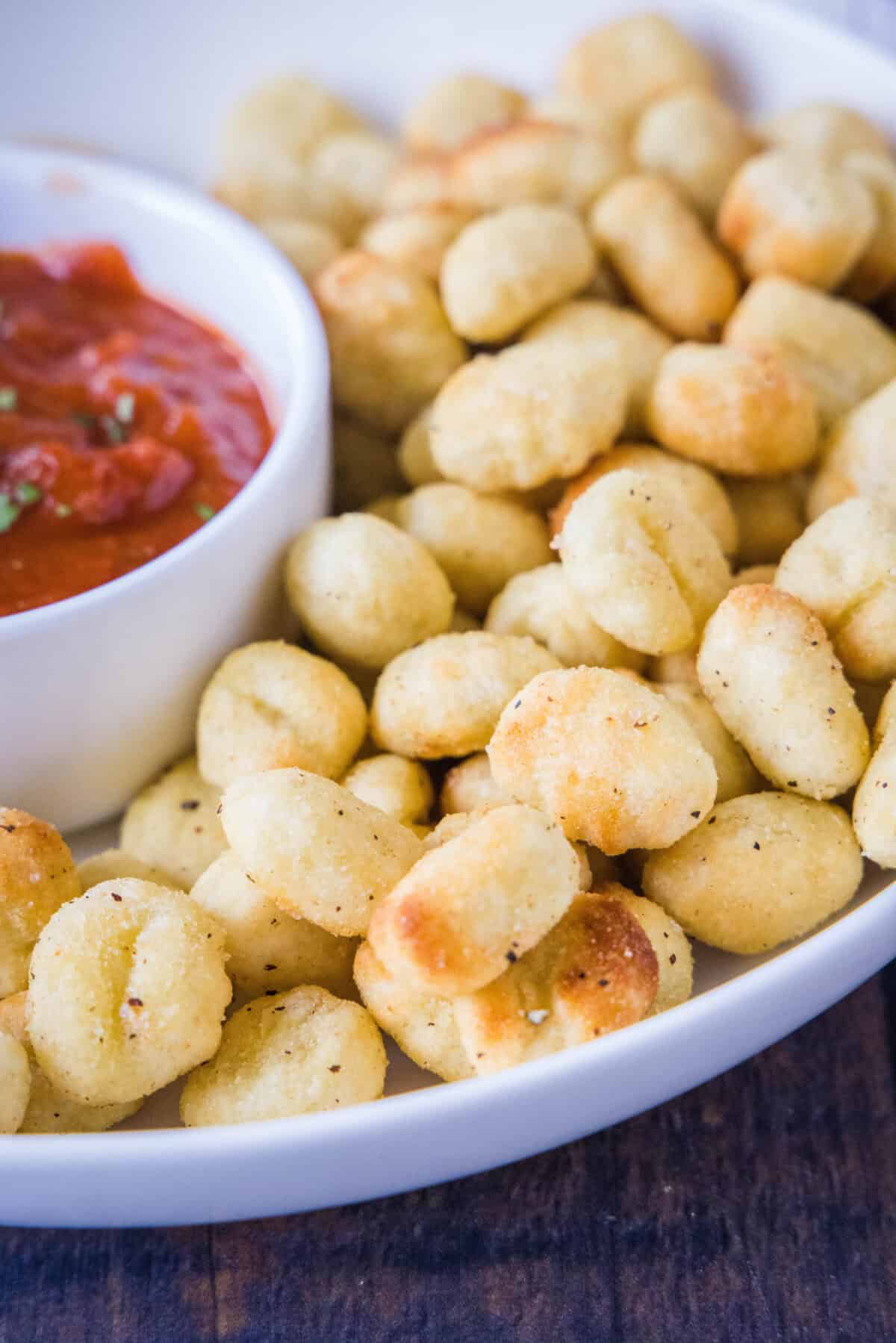 crispy air fryer gnocchi on a serving plate