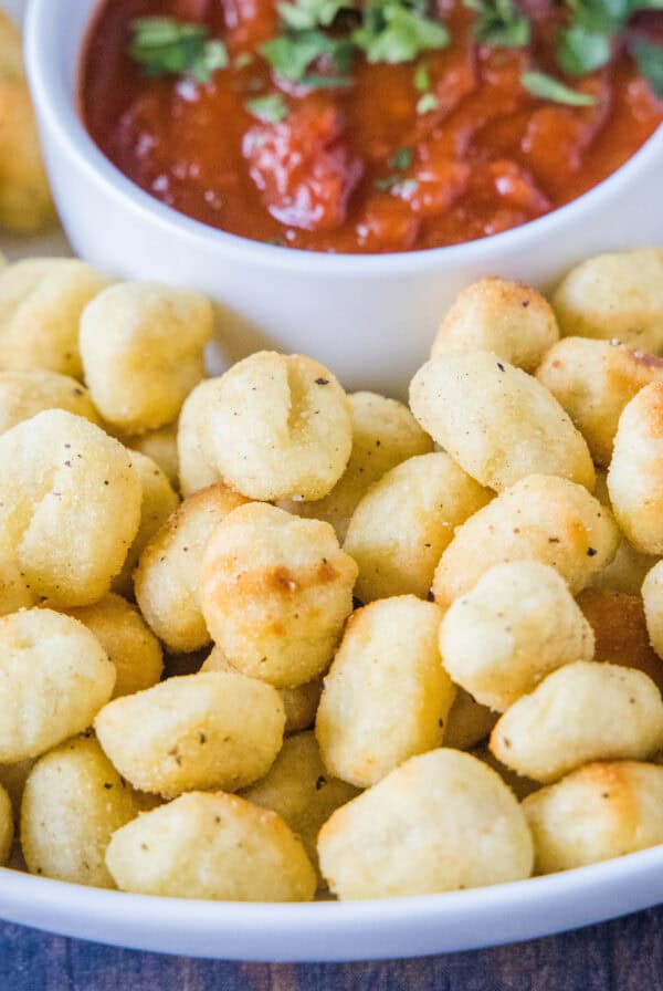 cropped close up air fryer gnocchi on a plate