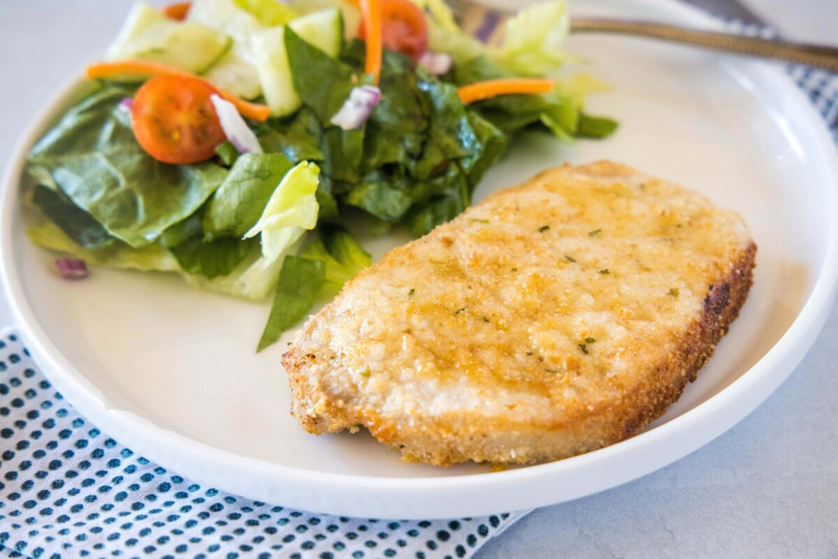 Air Fryer Pork Chops - make delicious, juicy, and tender pork chops in your air fryer in just 10 minutes! So simple and the perfect weeknight meal.