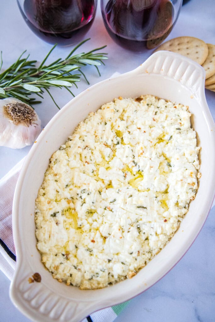 looking down on a serving dish with goat cheese dip in it