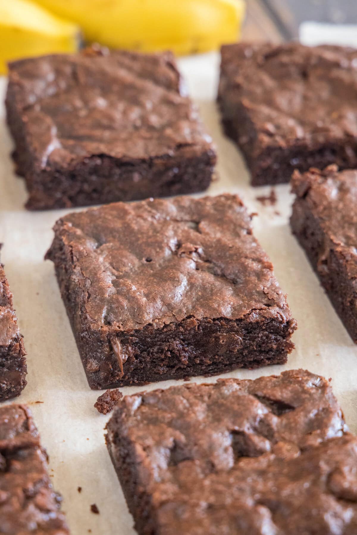sliced banana brownies on a cutting board