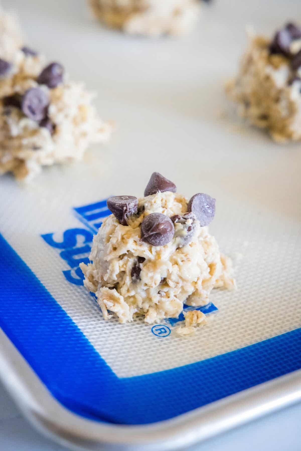 banana chocolate chip cookie dough on baking sheet