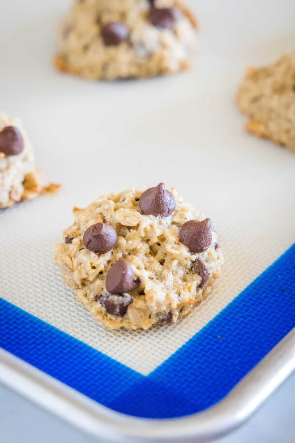 baked banana chocolate chip cookies on a baking sheet