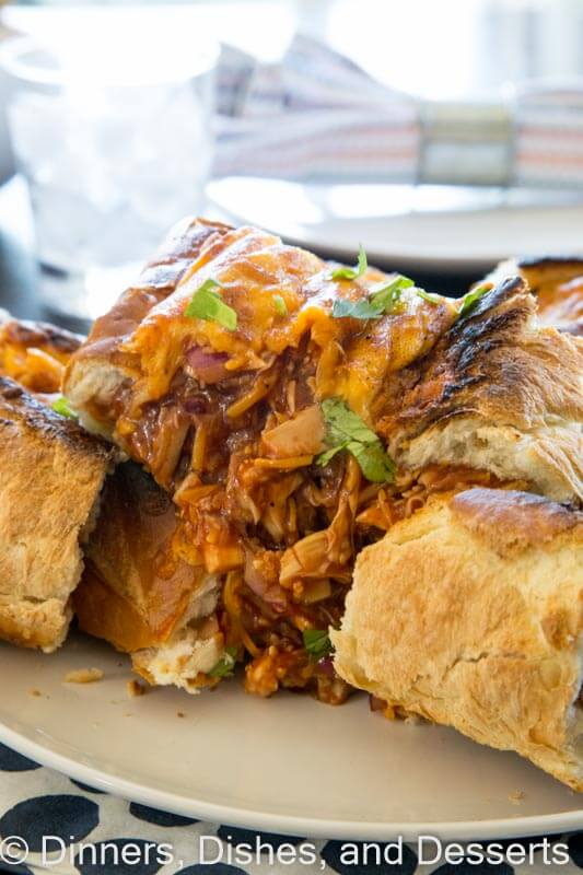 barbecue chicken stuffed french bread on a plate