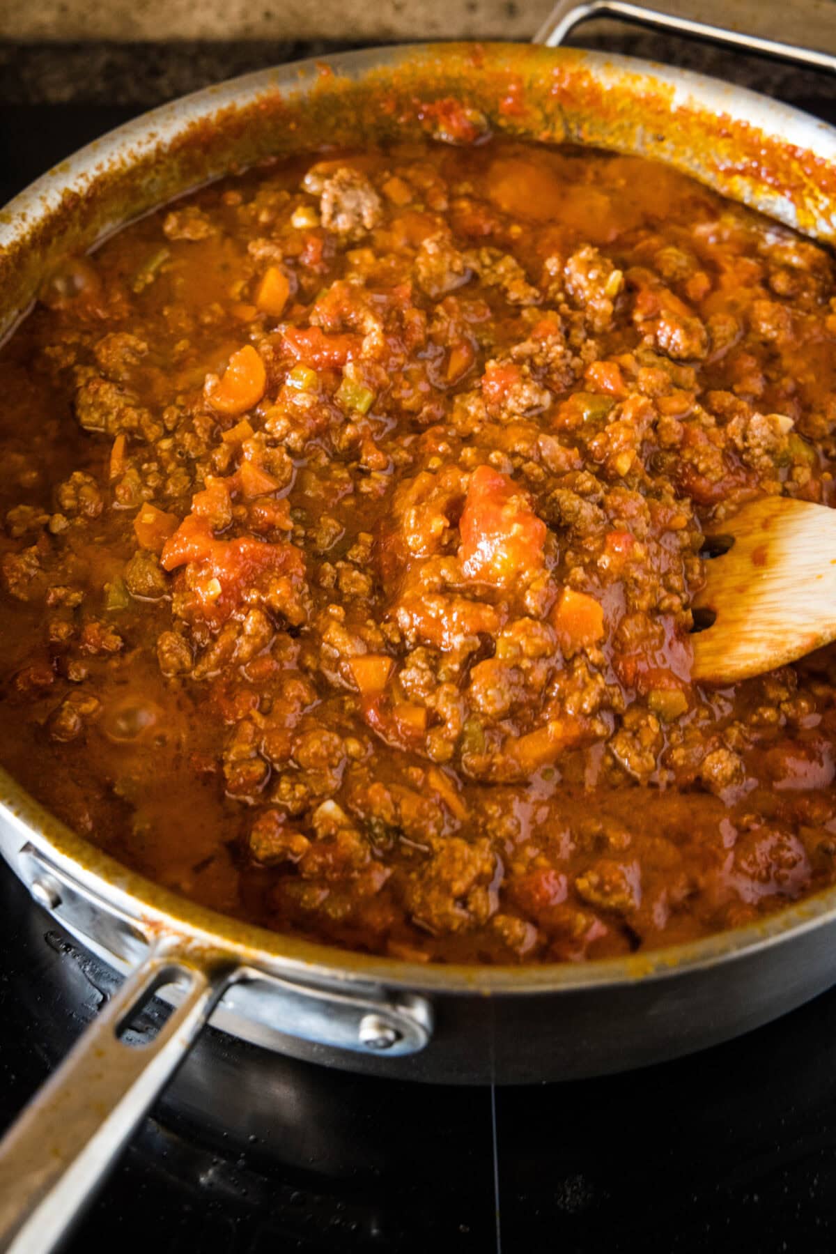 Beef ragu in a large deep skillet.