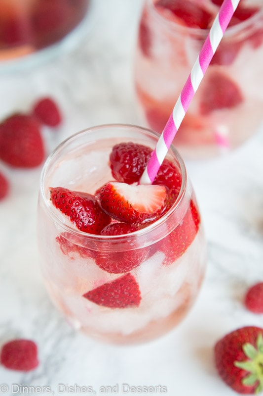 A close up of a cup, with Sangria and Berry