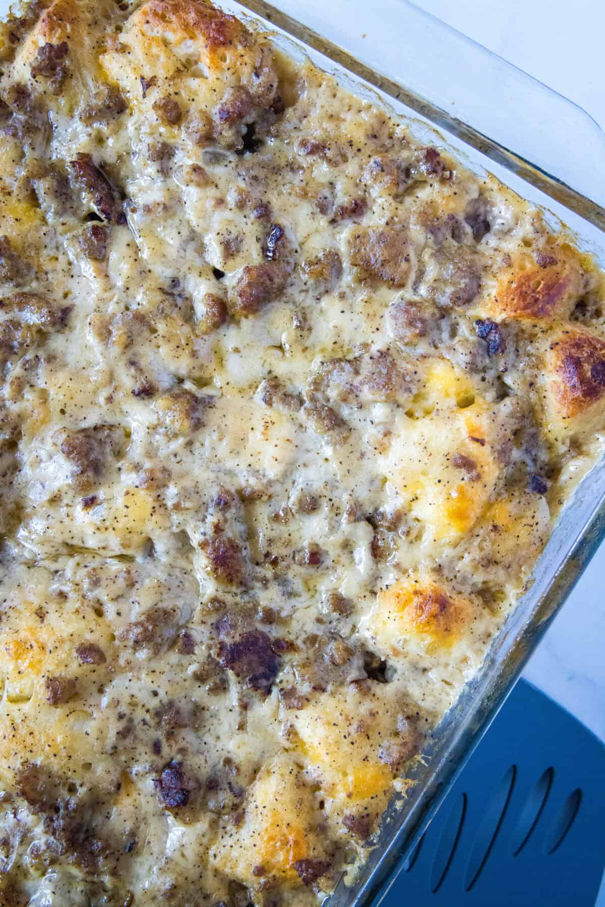 looking down on casserole dish of biscuits and gravy casserole