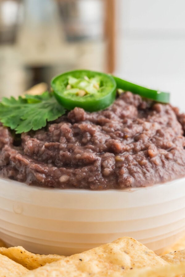 cropped close up black bean dip in a bowl