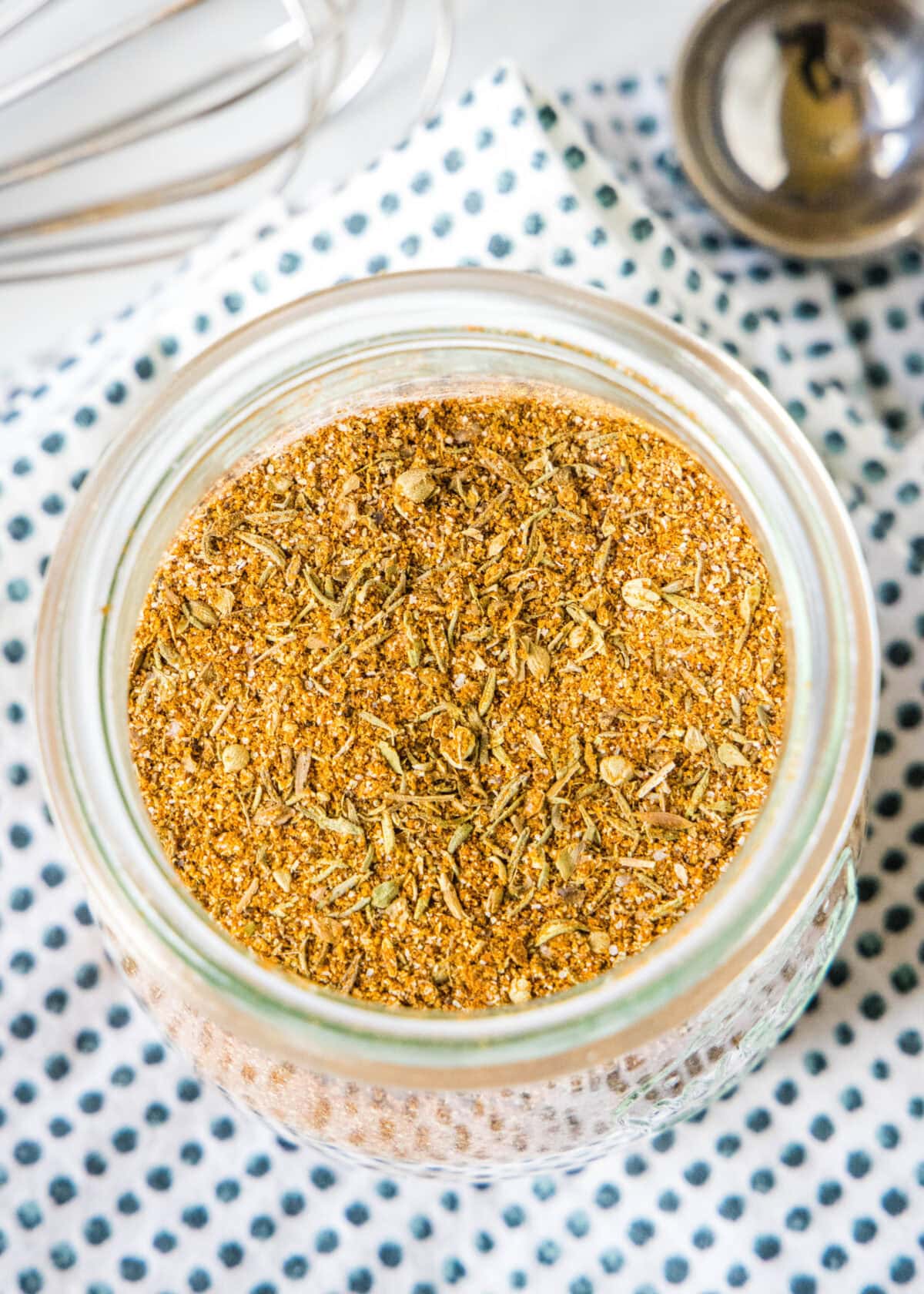 looking down on spice jar of blacken seasoning