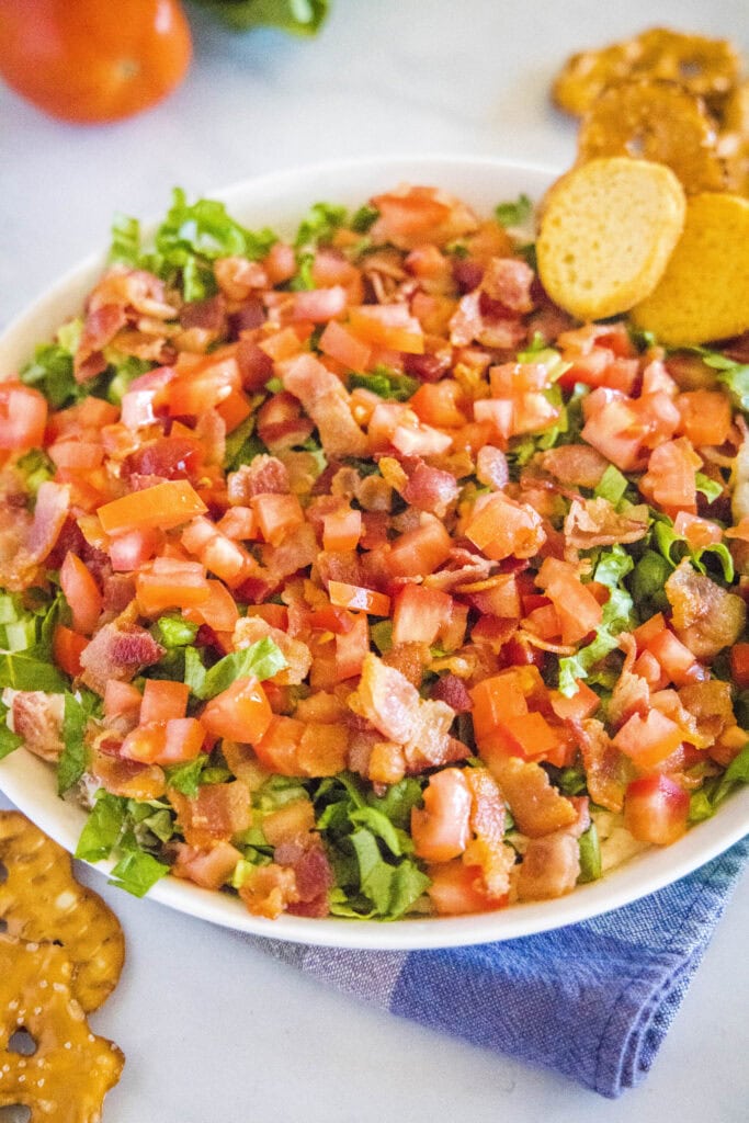 blt dip with in a bowl with crackers