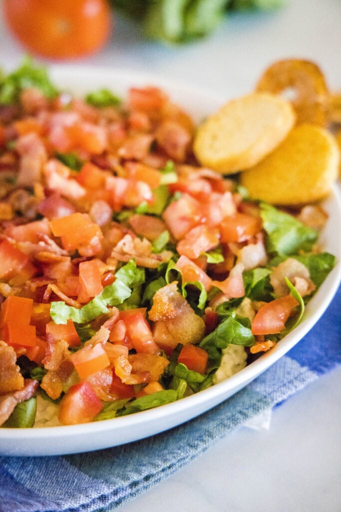 close up of blt dip on a serving platter