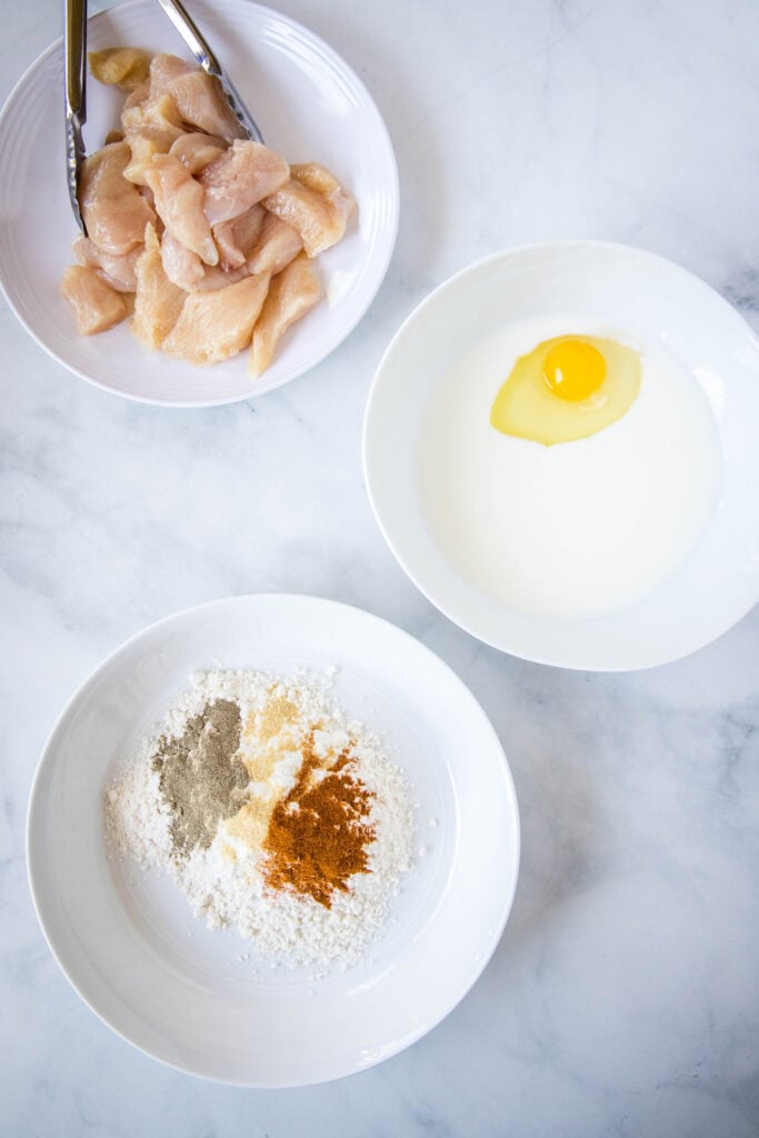 ingredients in bowls for boneless chicken wings