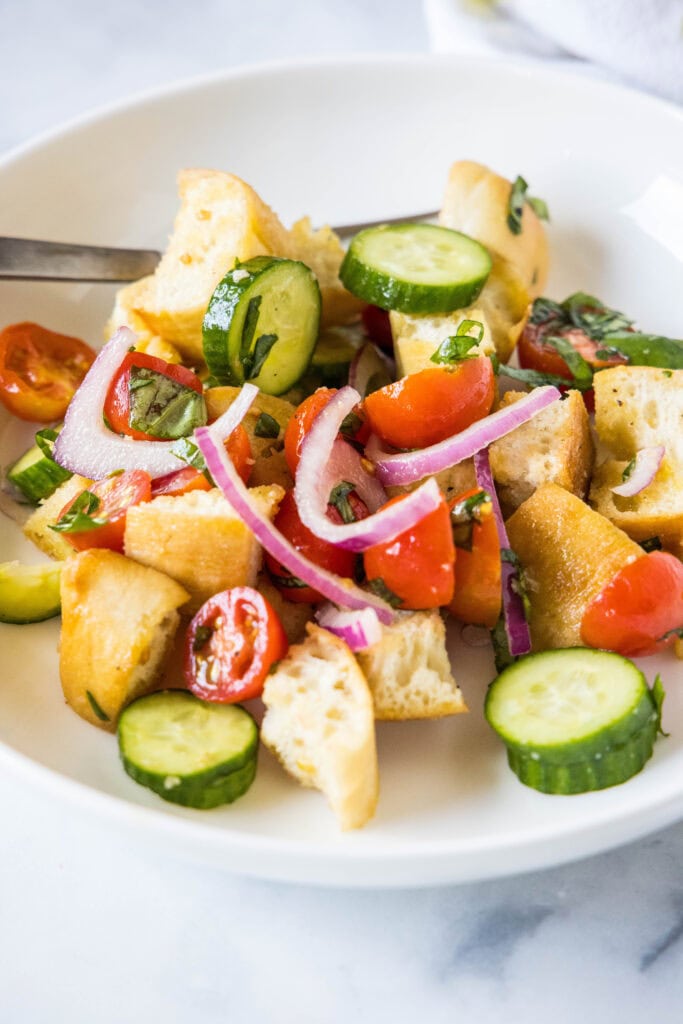 bread salad on a white plate