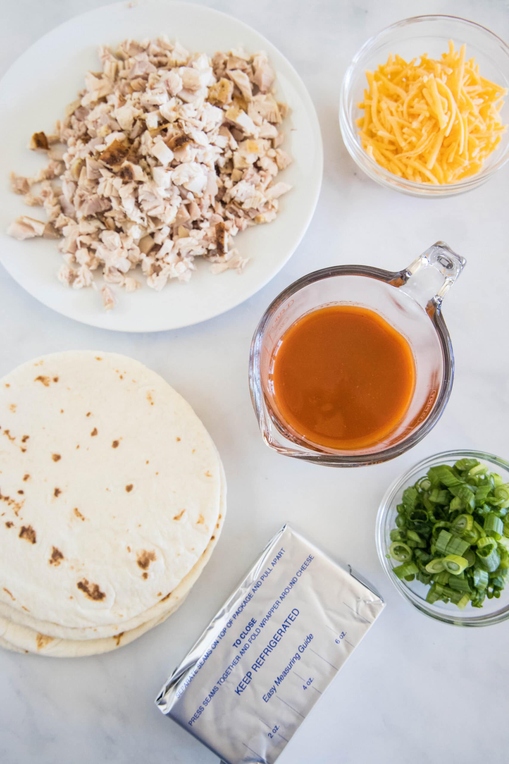 Ingredients for Buffalo chicken pinwheels.