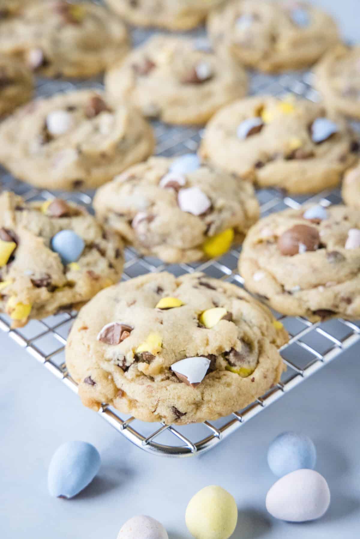 cadbury mini egg cookies cooling on a rack