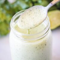 close up spooning cafe rio dressing out of a jar