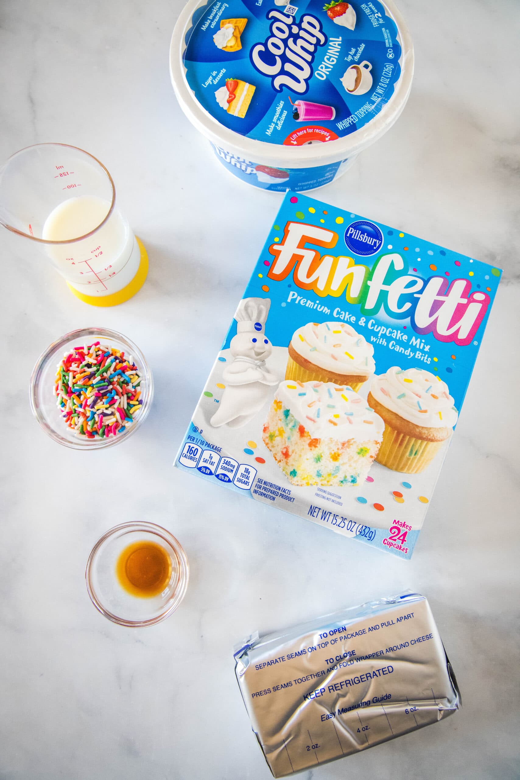 Ingredients for funfetti cake batter dip.