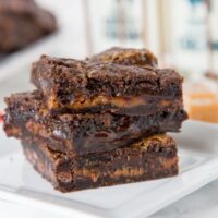 Caramel Layer Bars - rich and chocolate brownie filled with chocolate chips and gooey caramel. You will not be able to stay away from them!