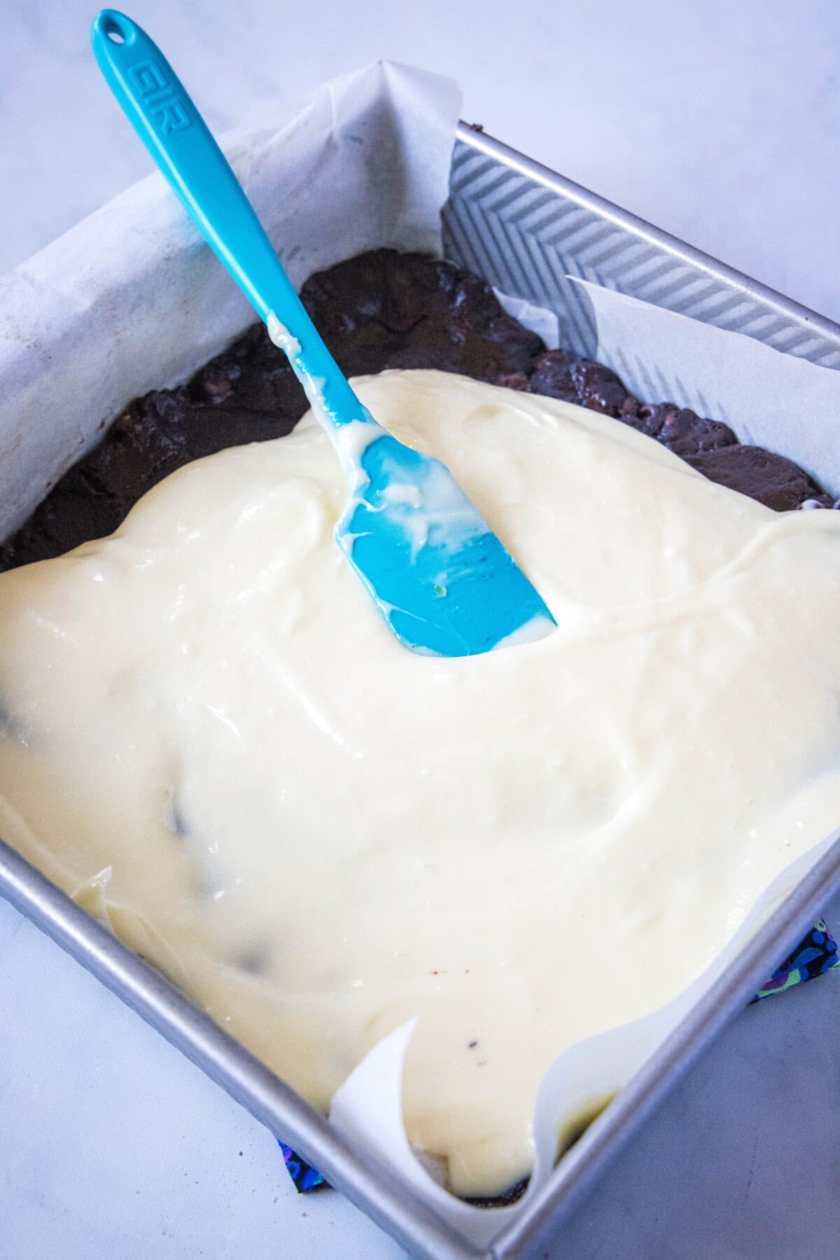 adding cheesecake layer to brownies