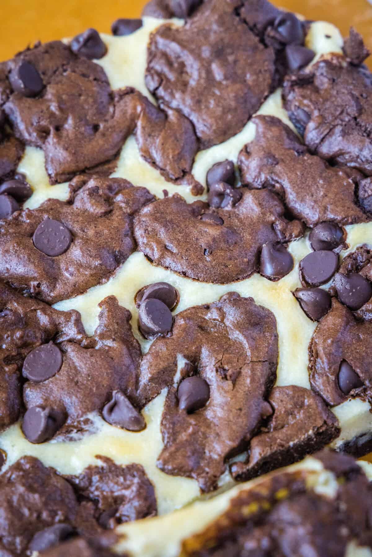 cheesecake brownies on cutting board