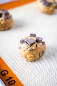 ball of cookie dough on baking sheet