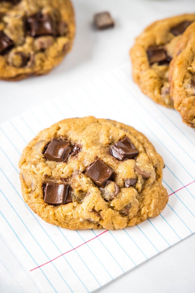 chocolate chunk cookies on a white surface