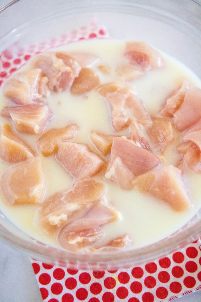 chicken marinating in milk and pickle juice