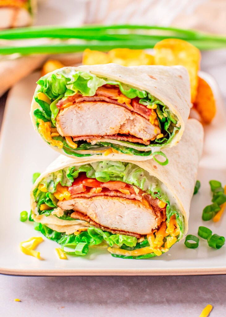 looking down at a chicken bacon ranch wrap cut in half