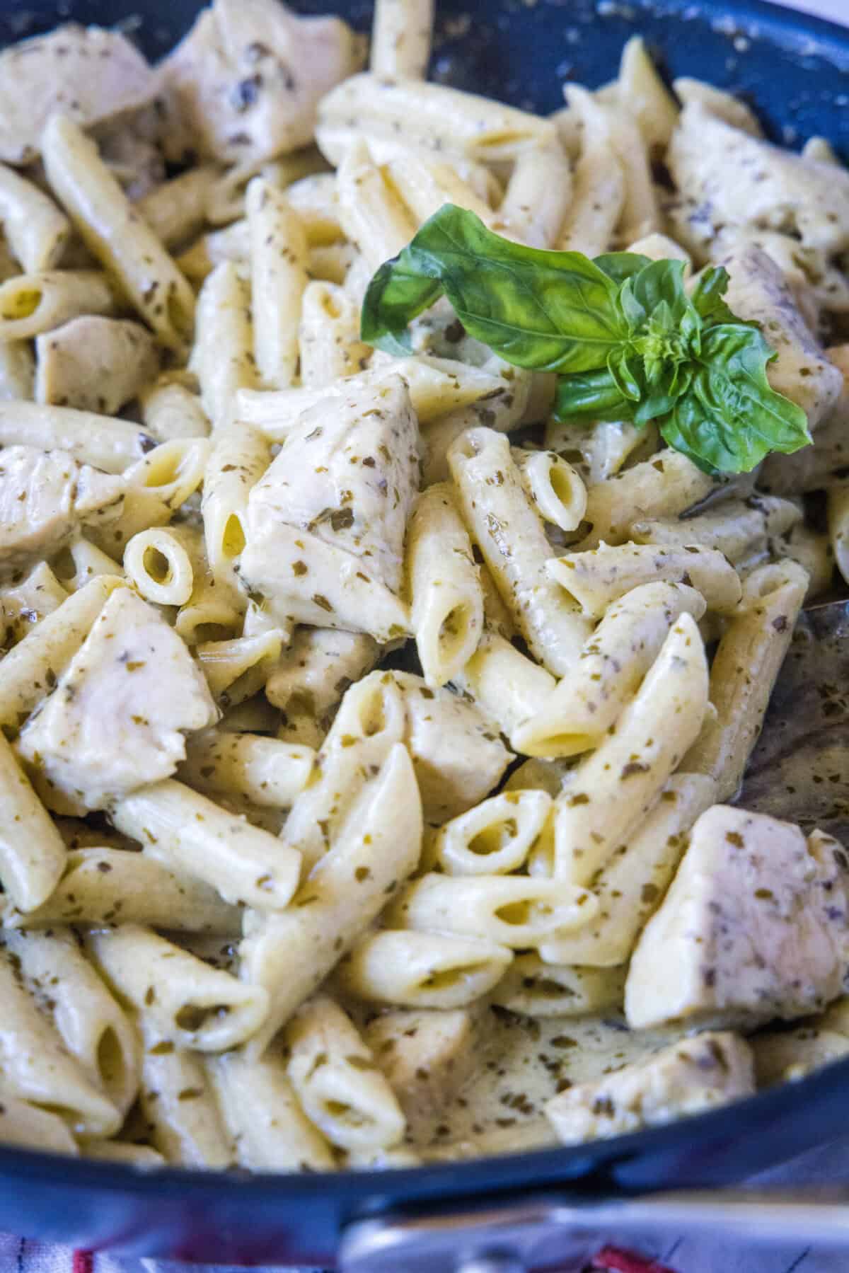 chicken pesto pasta in skillet