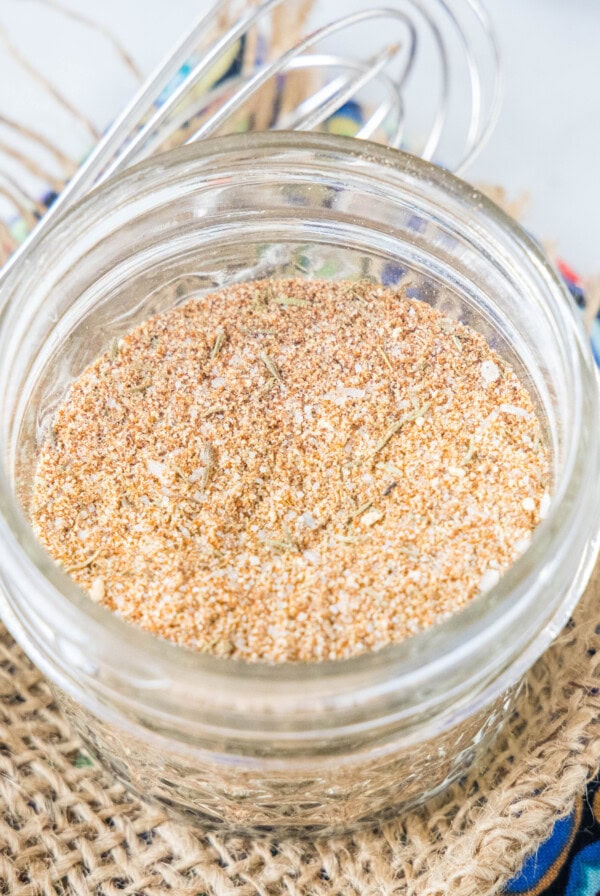 cropped close up chicken seasoning in a mason jar