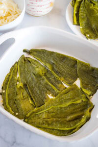 layer of peppers in baking dish