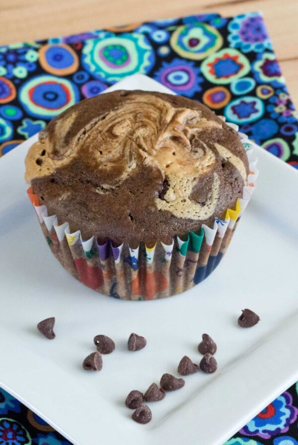 Double Chocolate Peanut Butter Swirl Muffins - Soft and tender Double Chocolate Muffins, with a swirl of peanut butter on top!