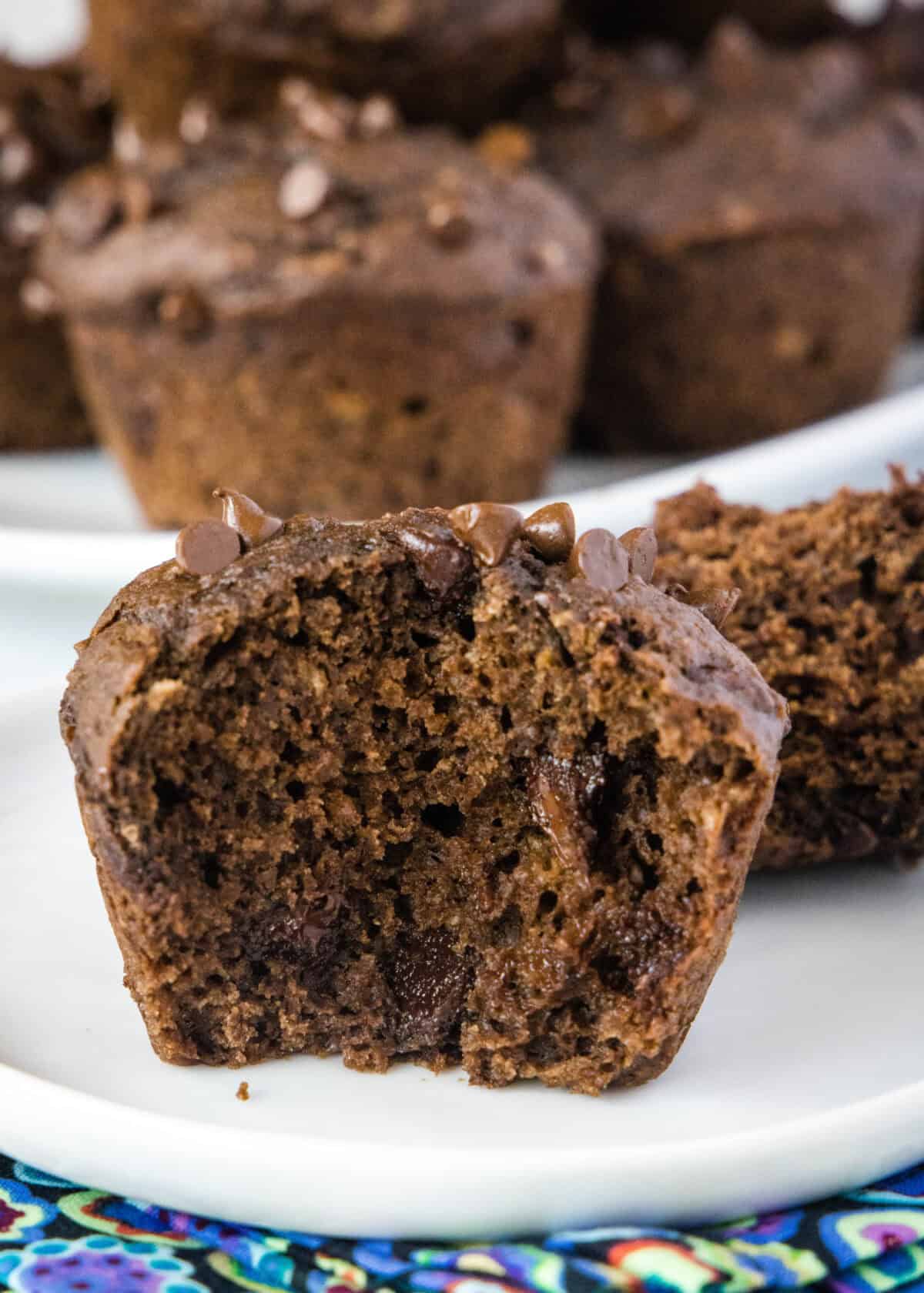 chocolate applesauce muffin with a bite missing