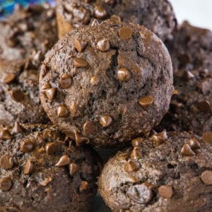 cropped close up chocolate applesauce muffins on a serving platter