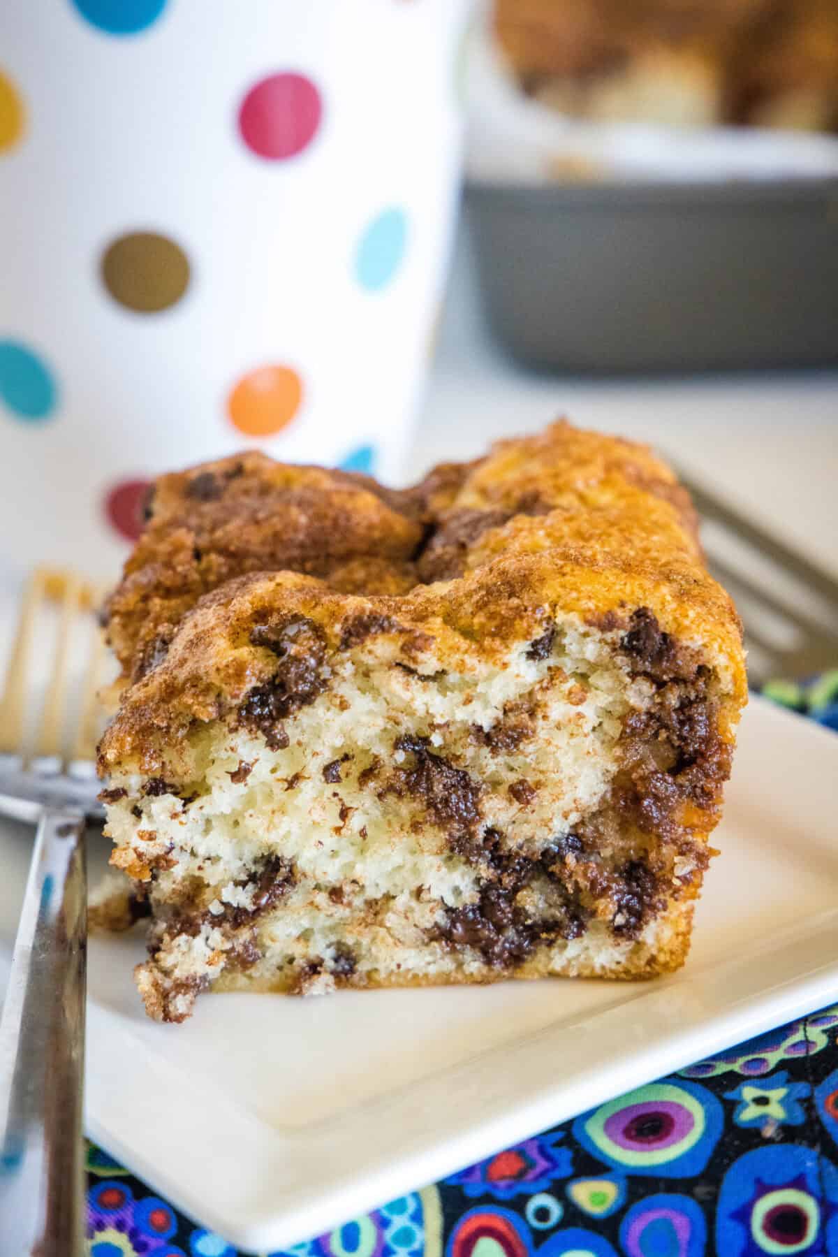 chocolate chip coffee cake on a white plate