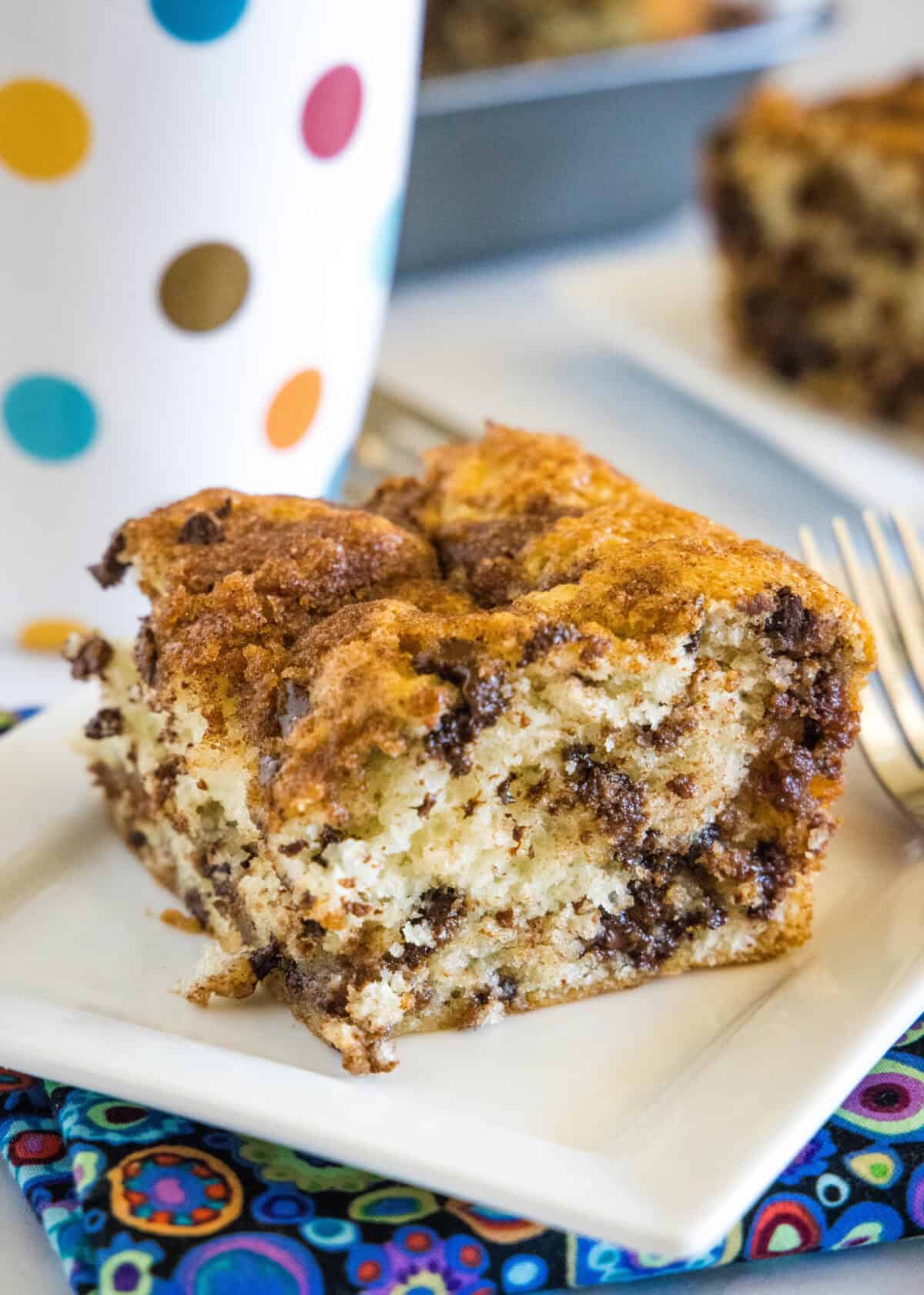 chocolate chip coffee cake on a white plate
