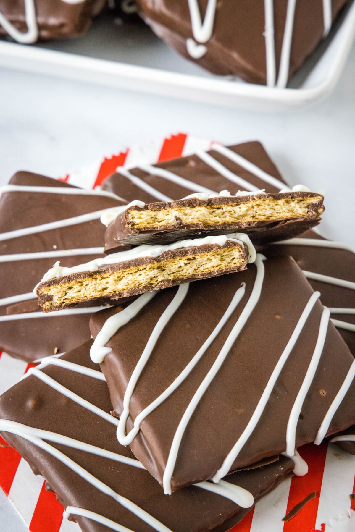 chocolate covered graham crackers with one cut in half