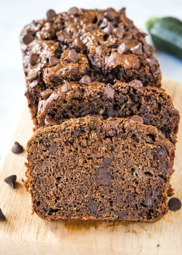 sliced chocolate zucchini bread on a cutting board