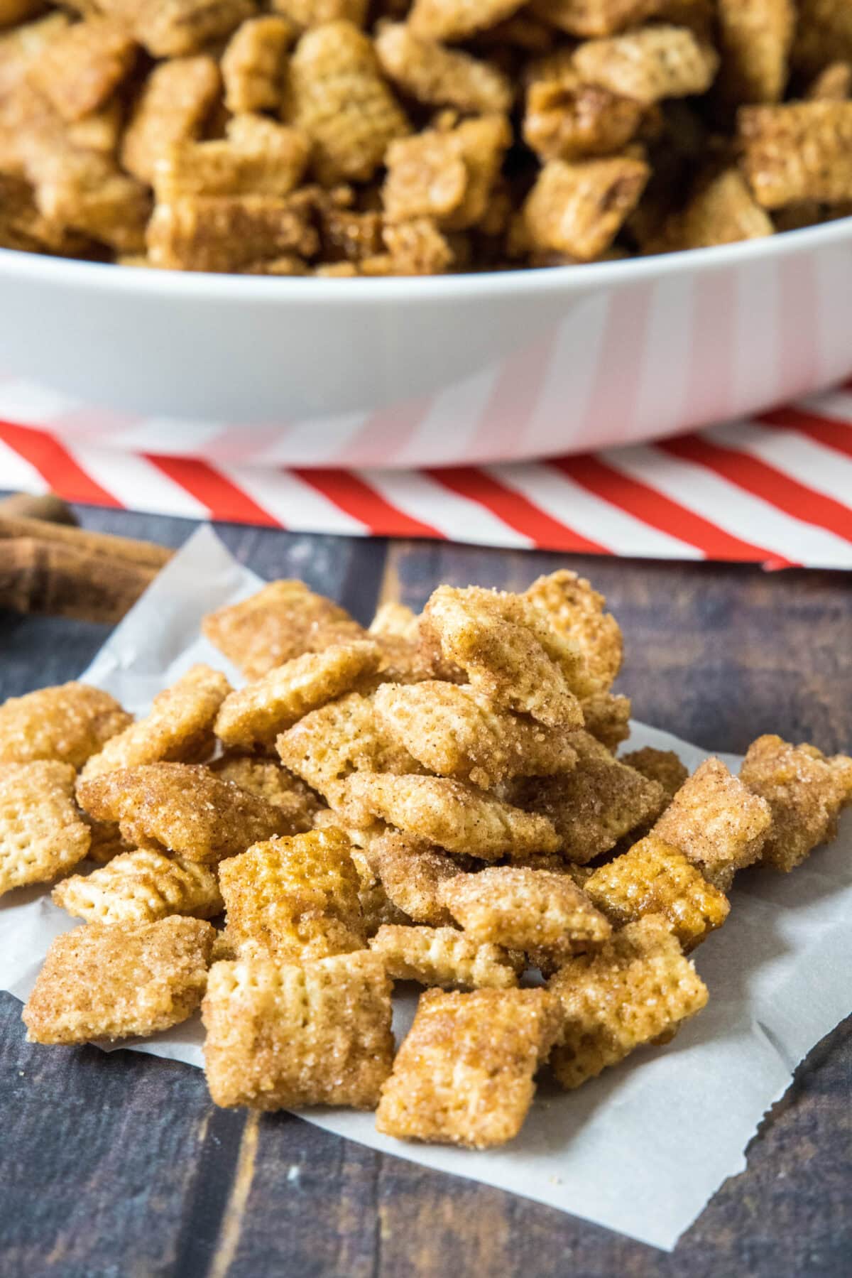 churro chex mix on parchment paper