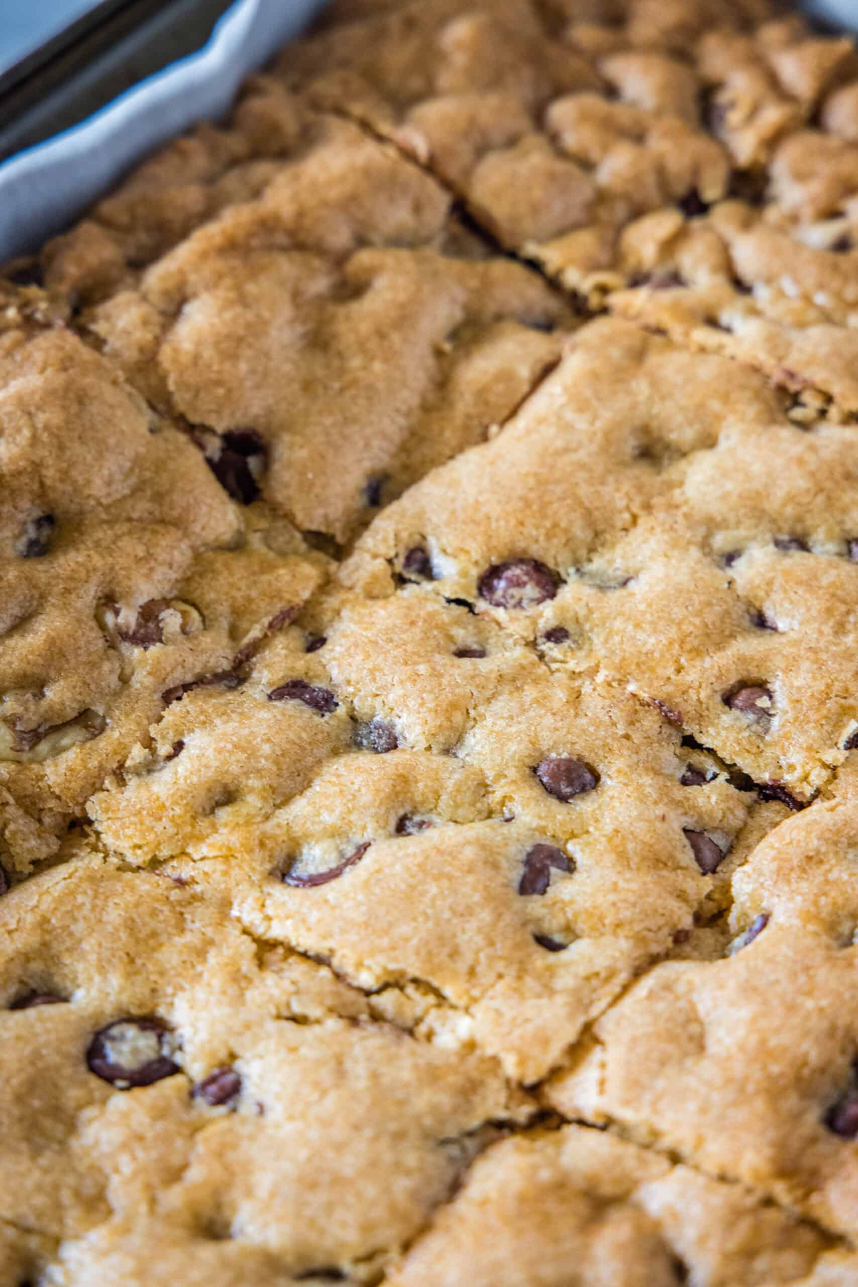 Close up of Congo bars cut into squares inside a baking pan.