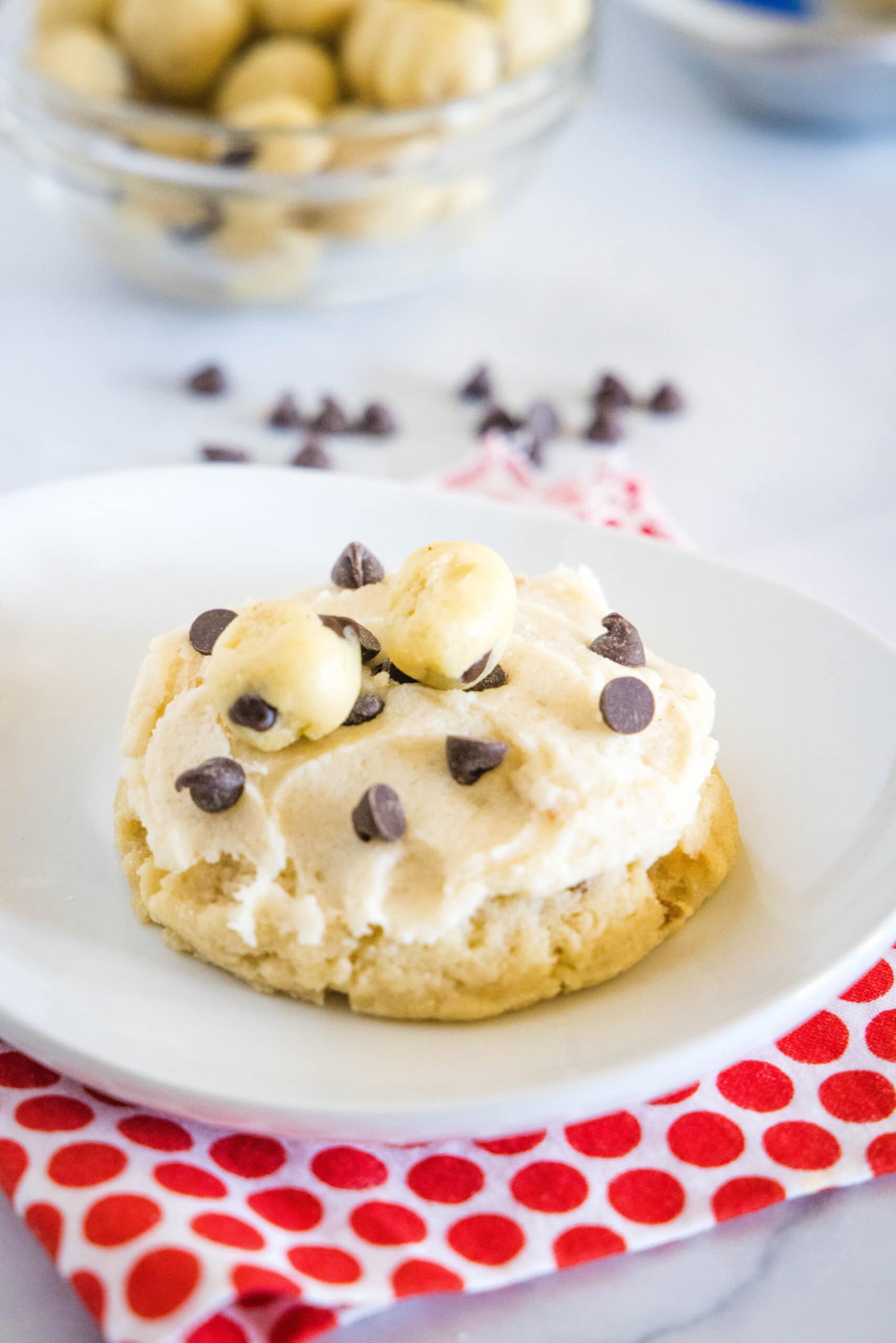 A cookie dough cookie on a white plate.