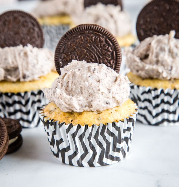 Cookies and Cream Cupcakes - The best Oreo Cupcakes!  A moist vanilla cupcake with crushed Oreos inside and then topped with a delicious Oreo buttercream frosting.  If you like cookies and cream these are definitely for you!