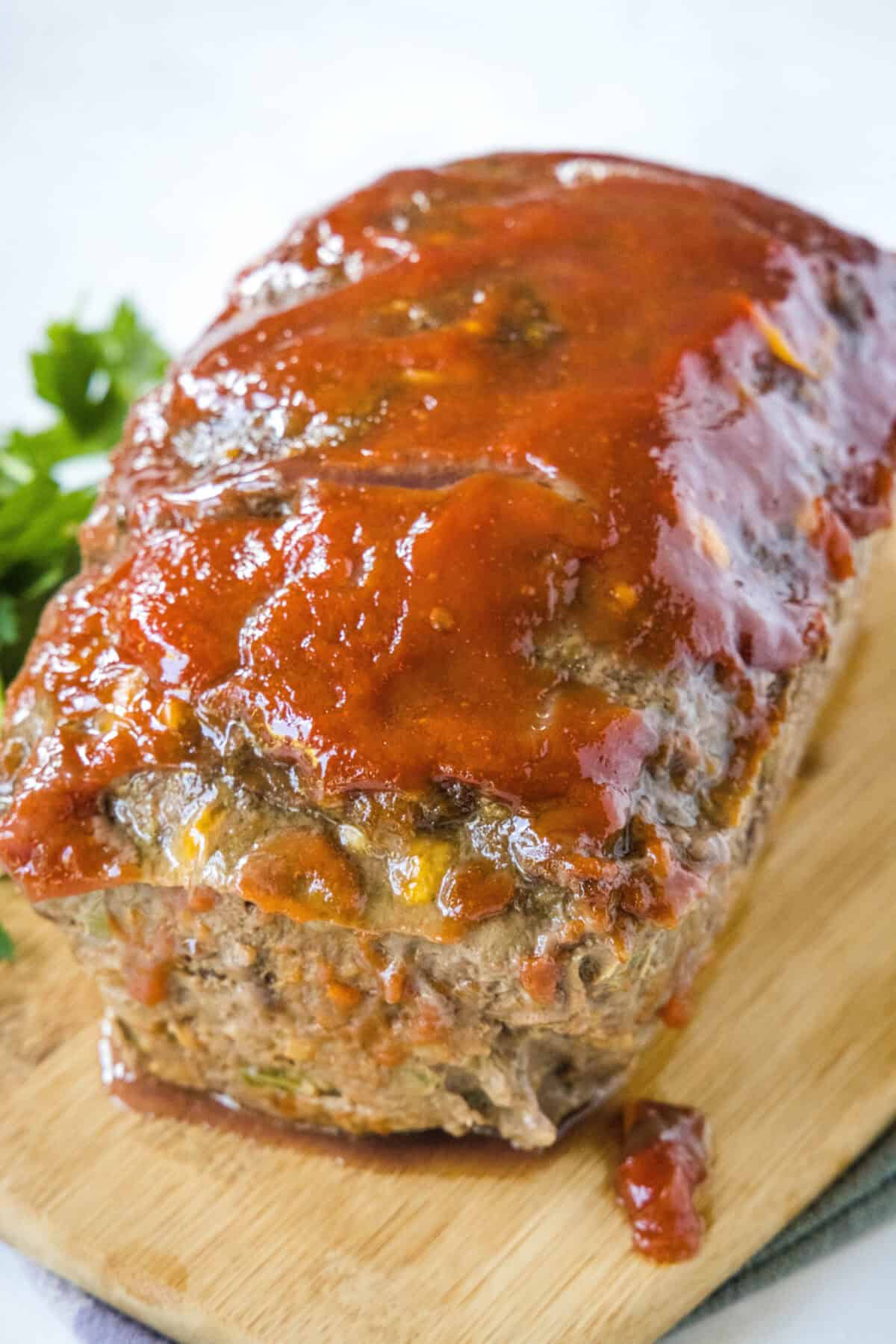 baked meatloaf on a cutting board