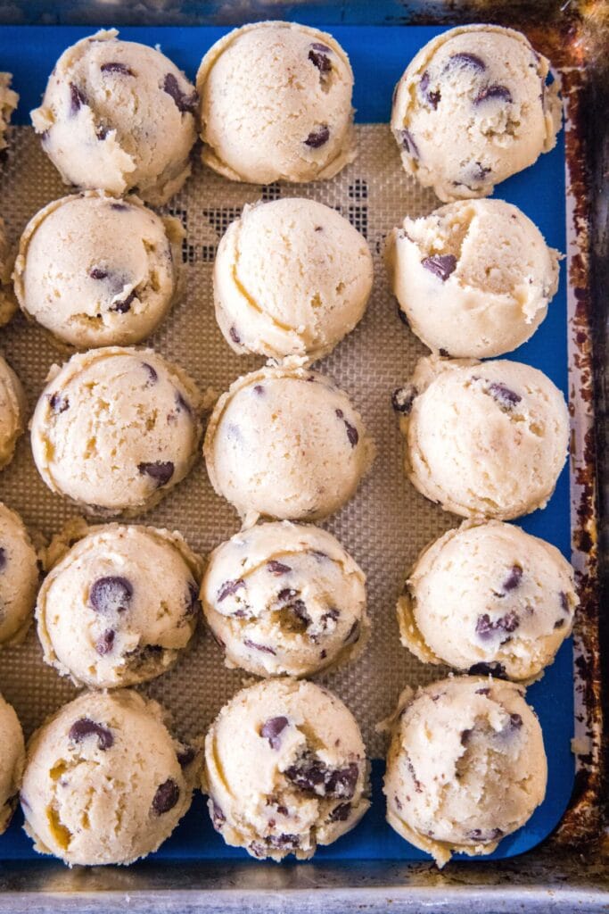 Balls of cookie dough on a baking sheet