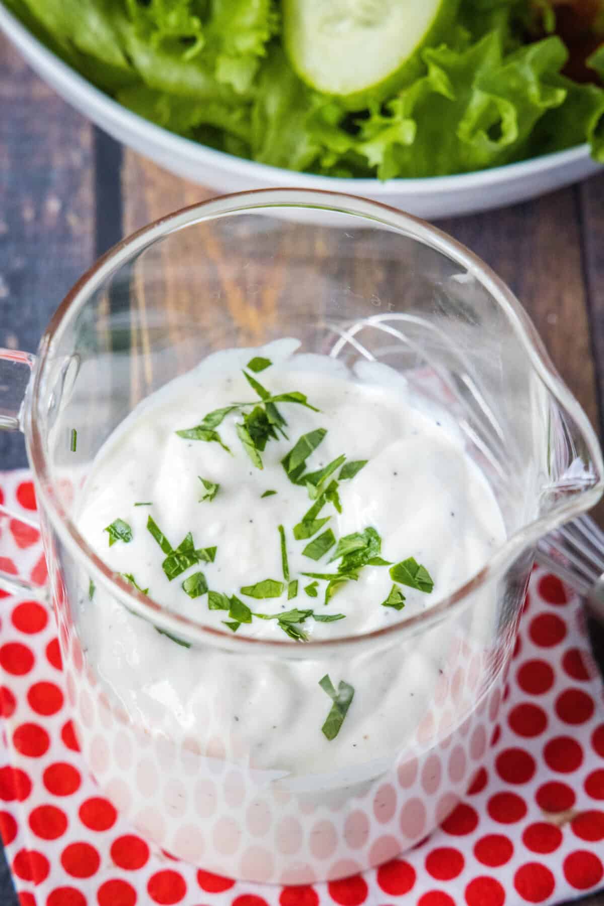 looking down on jar with creamy garlic dressing