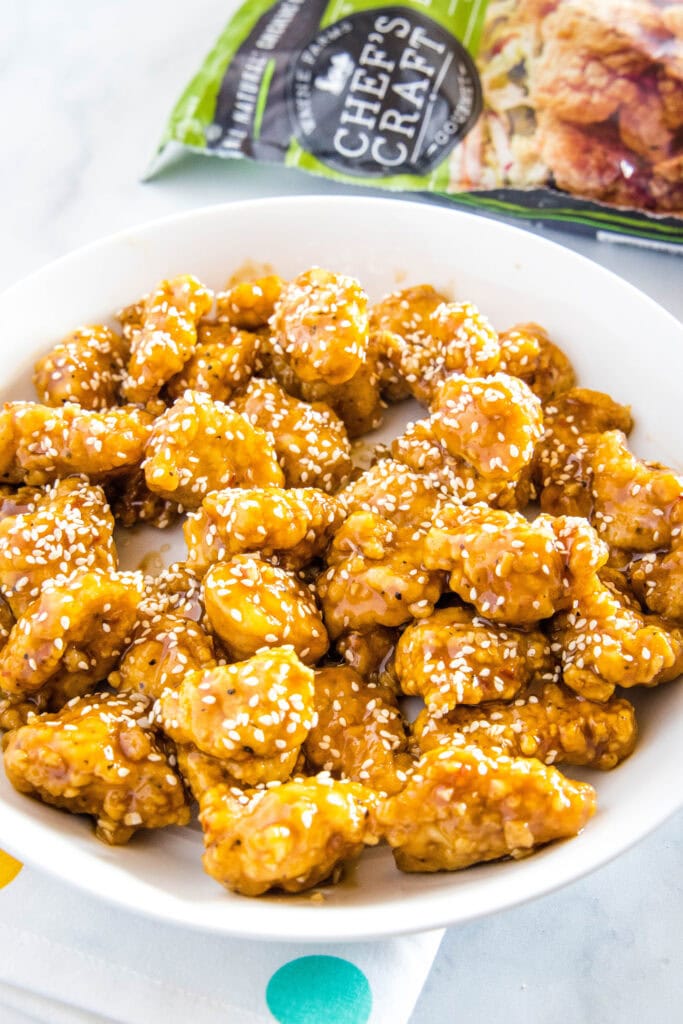 sesame chicken on a white plate