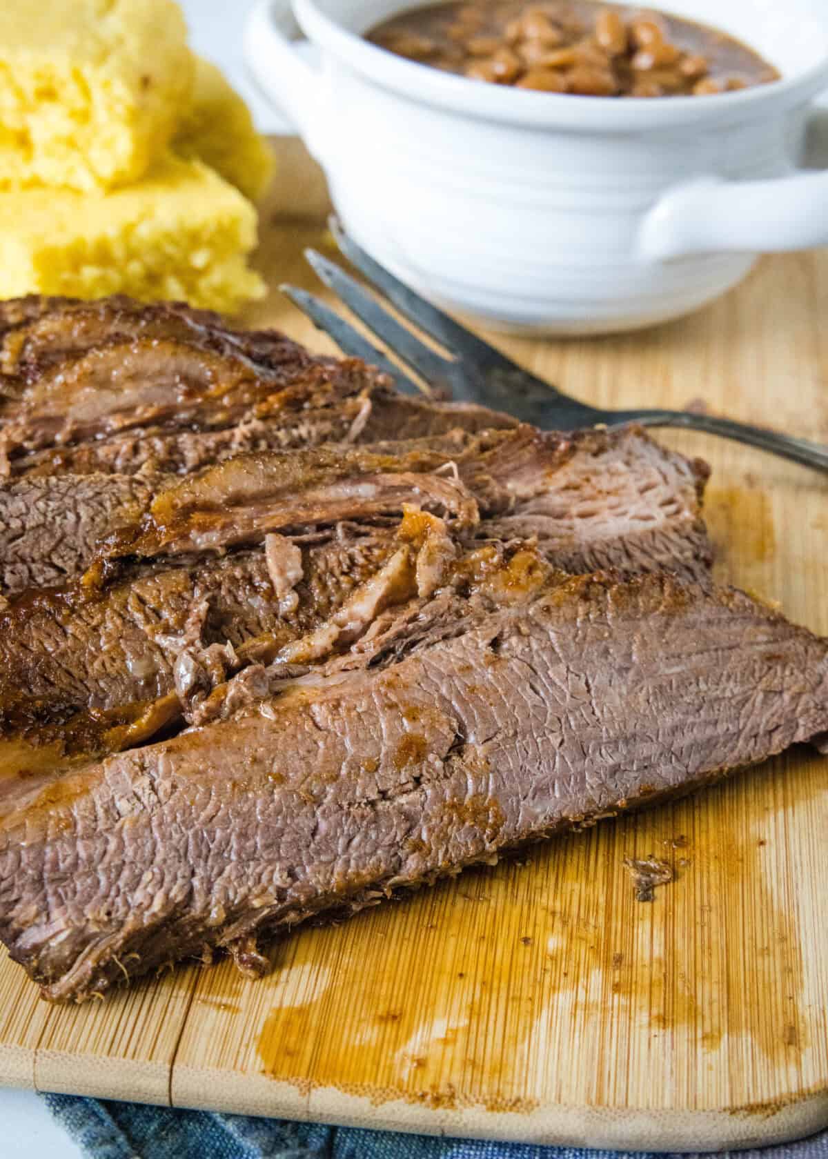 sliced brisket on cutting board