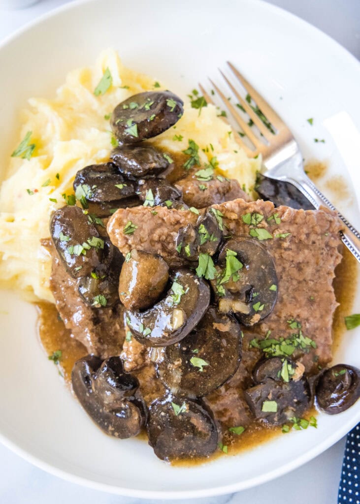 looking down on a plate of crockpot cube steak